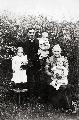 Karl och Hulda Karlsson med barnen Tyra, Jon och Jenny (Oppstu) 1912-13 